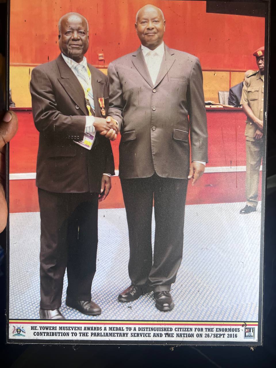 Okee Barmich Valerian receiving Presidential Medal